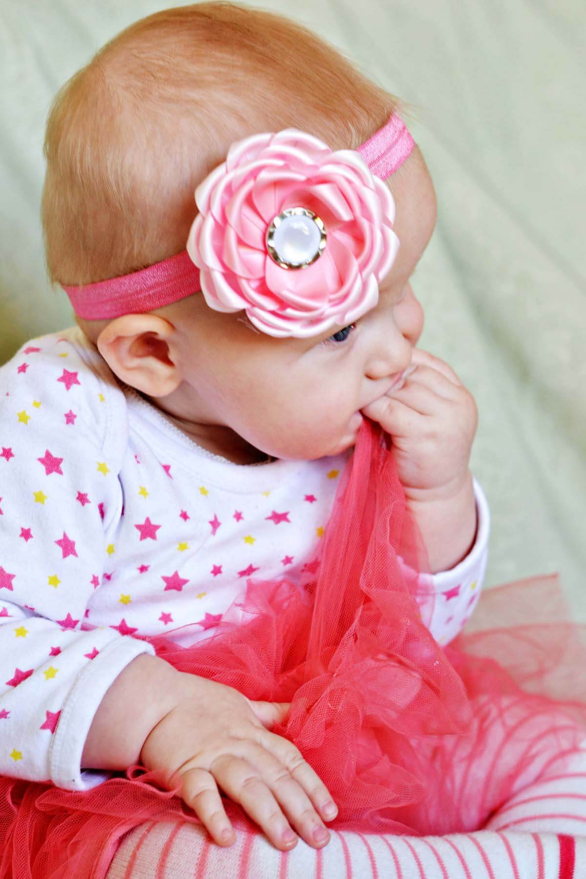 Baby girl with pink flower headband