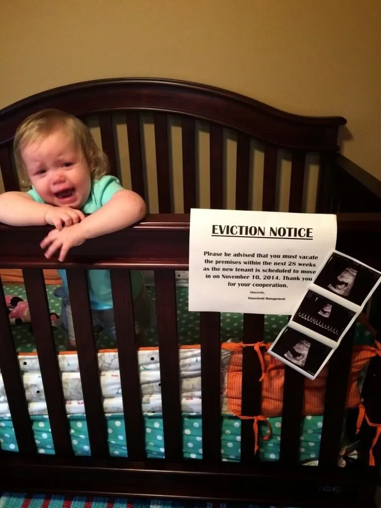 Funny pregnancy announcement with eviction notice
