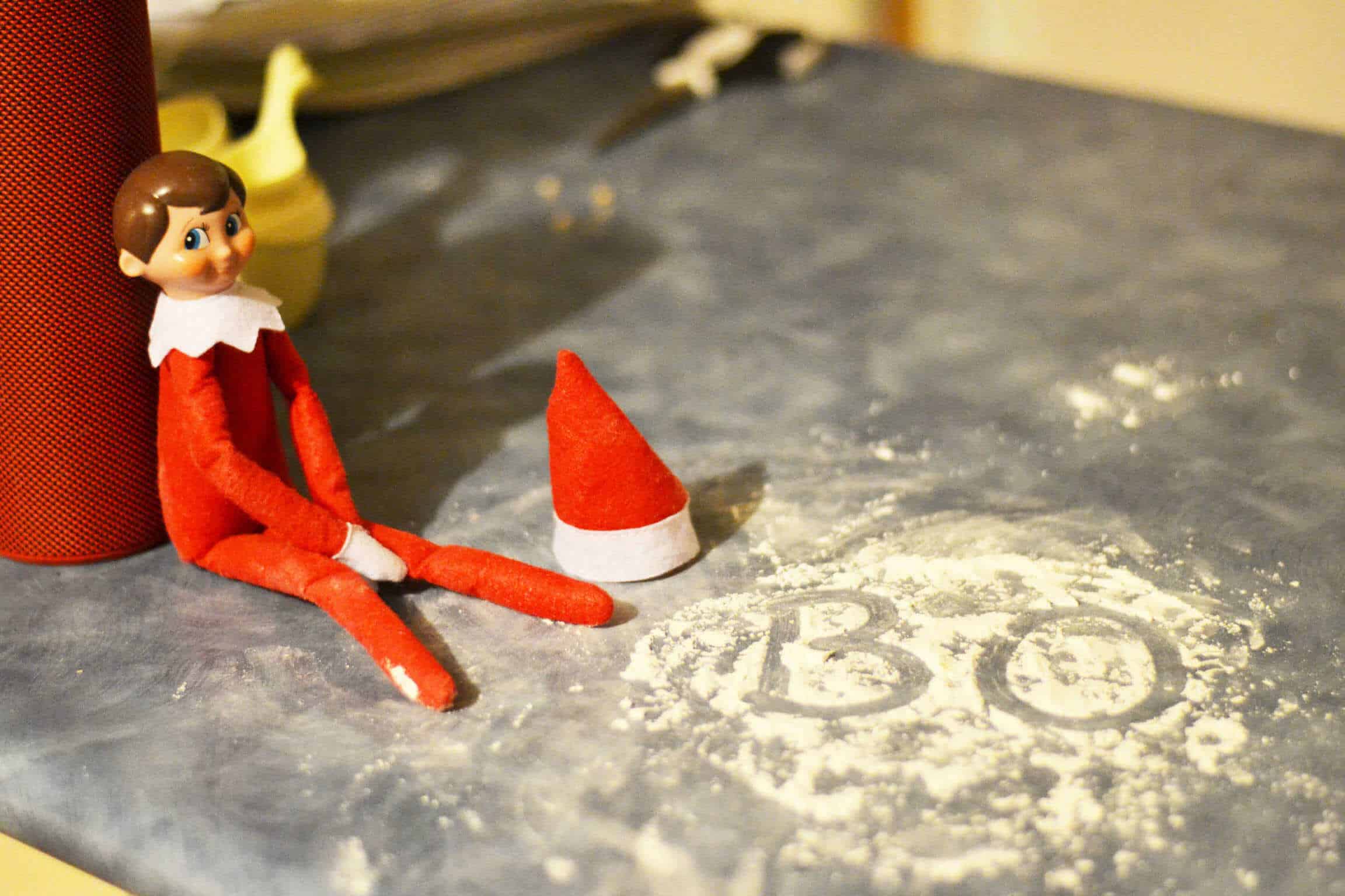 Creative & Easy Elf On The Shelf Ideas (50+ Ideas) 25 writing in flour
