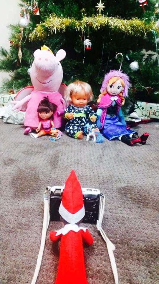Creative & Easy Elf On The Shelf Ideas (50+ Ideas) 10 Elf taking photos