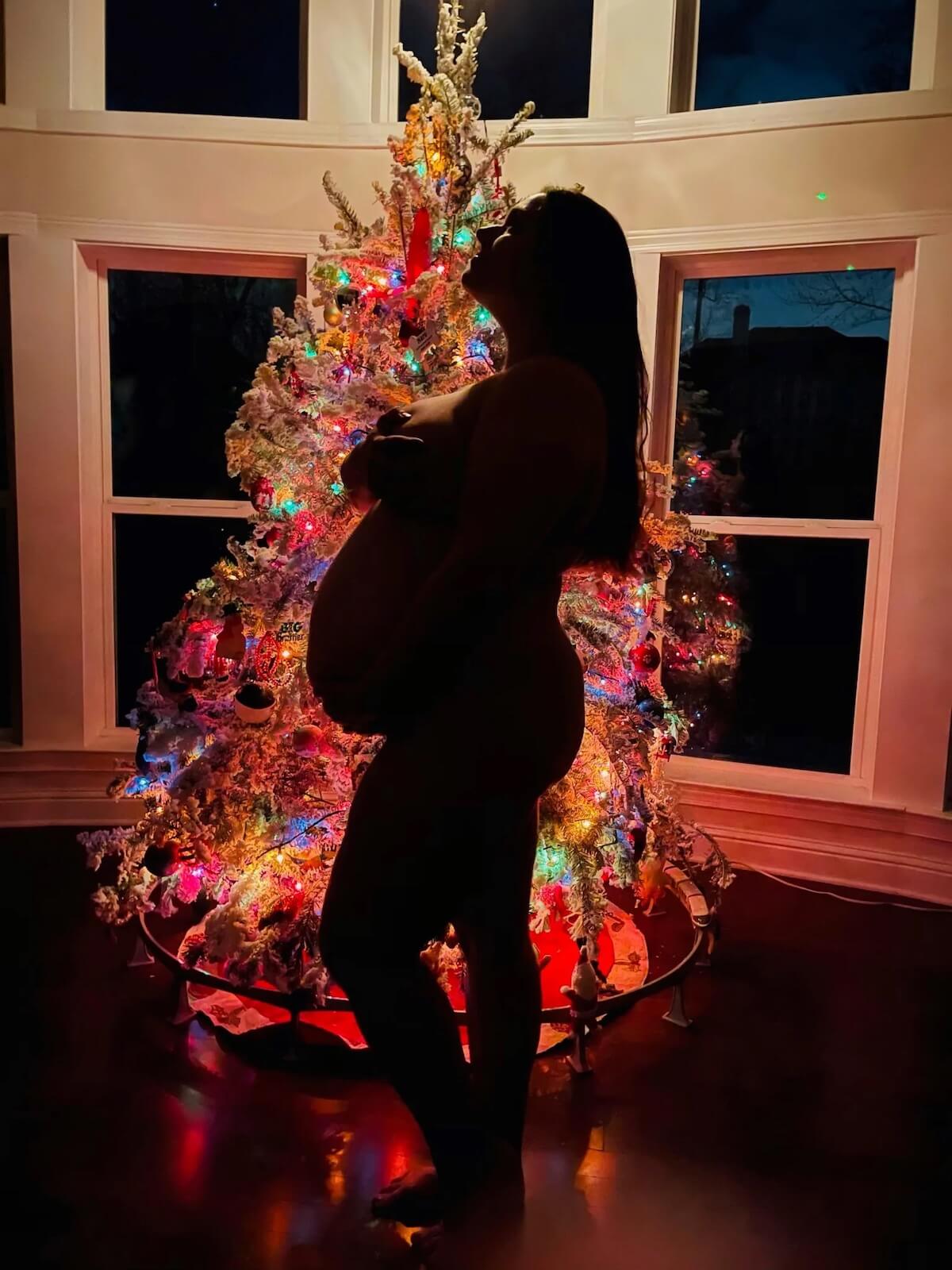 Pregnant woman christmas tree silhouette