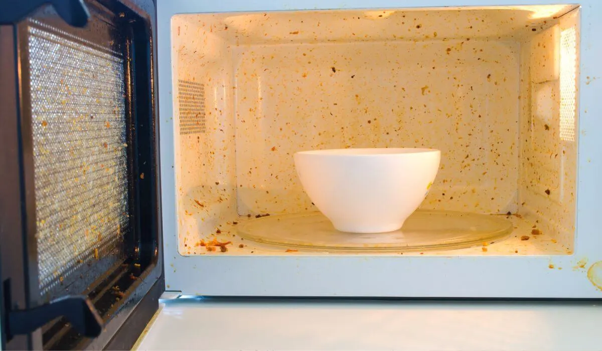 dirty microwave with bowl