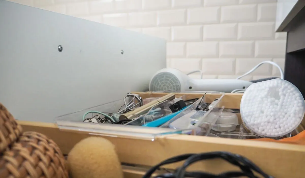 cluttered bathroom drawer