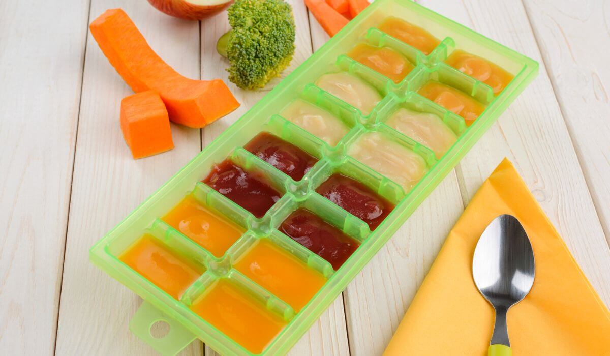 Homemade baby puree in ice cube tray