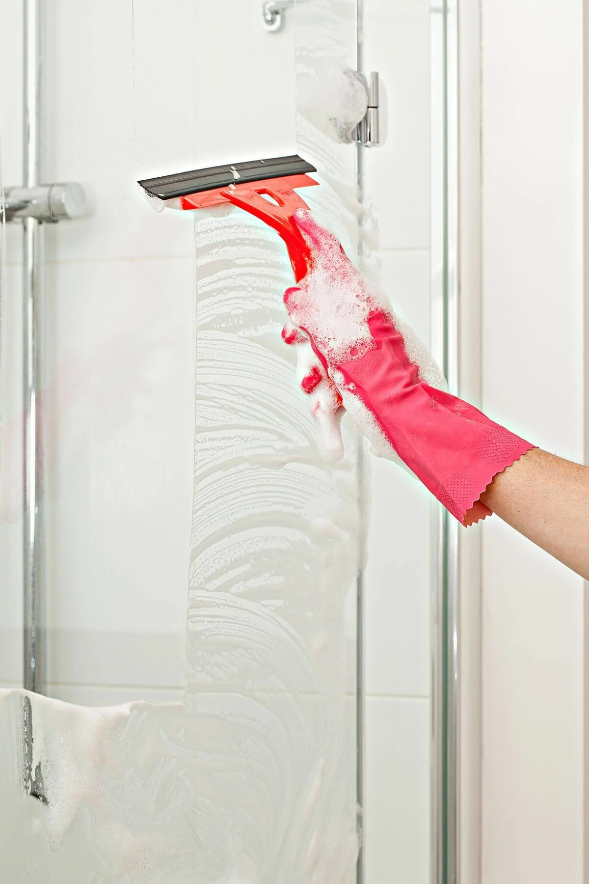 Cleaning shower with squeegee