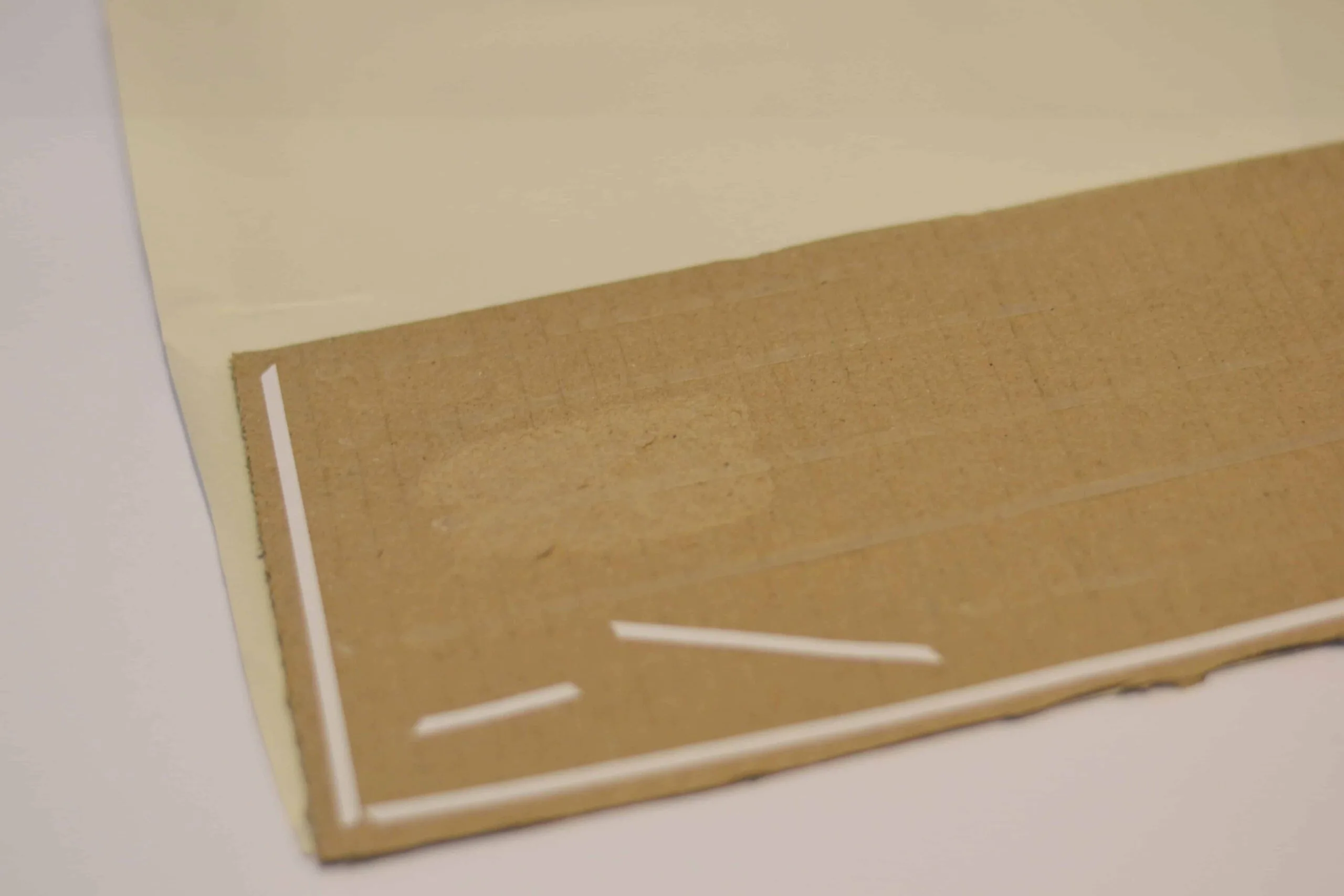 Cover cardboard with paper