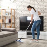 woman mopping her floor