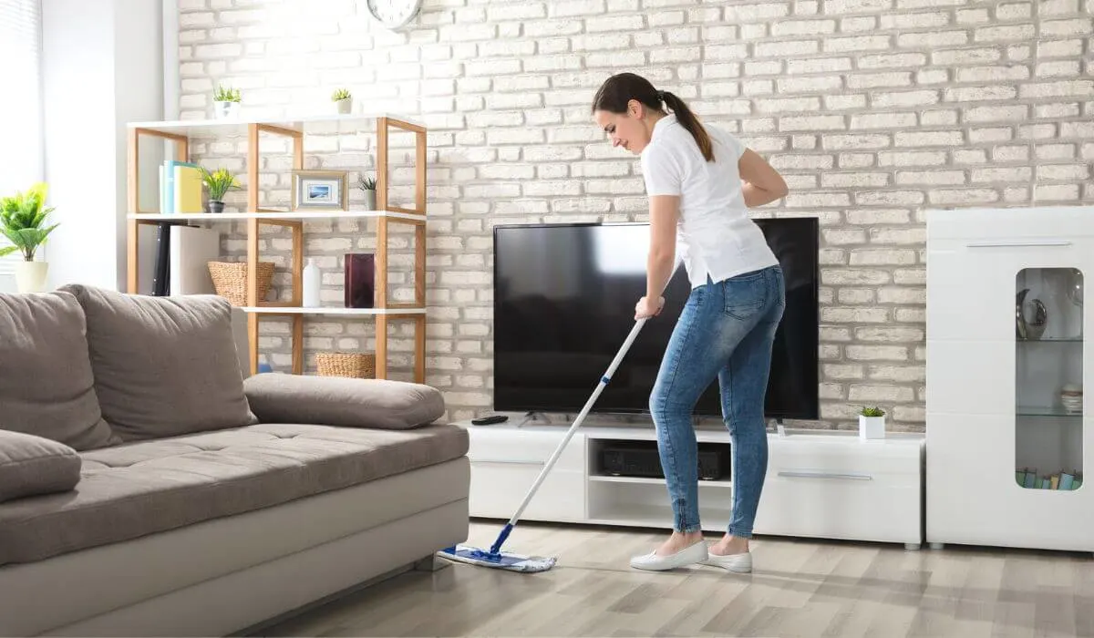 Woman mopping her floor