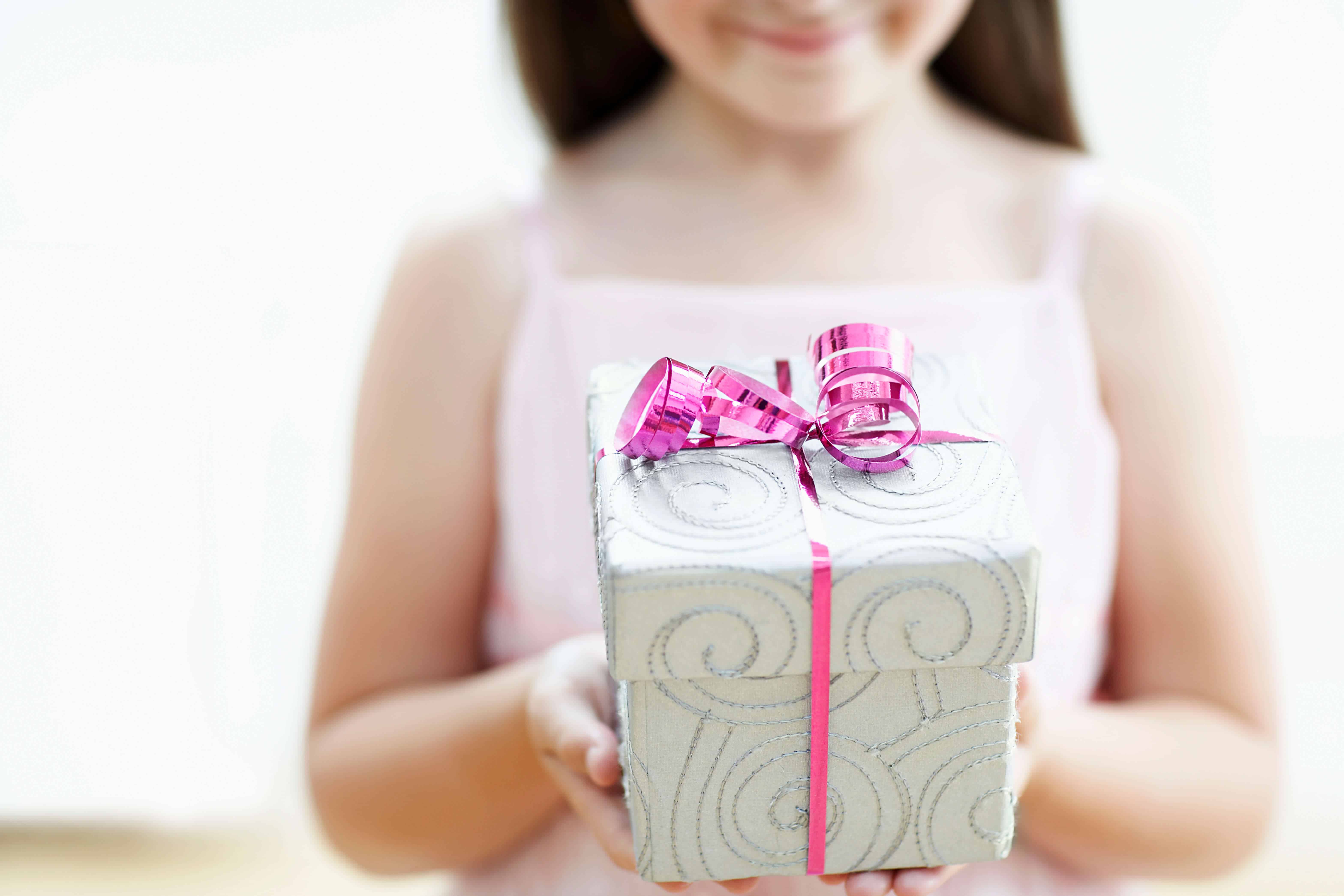 Child holding gift box