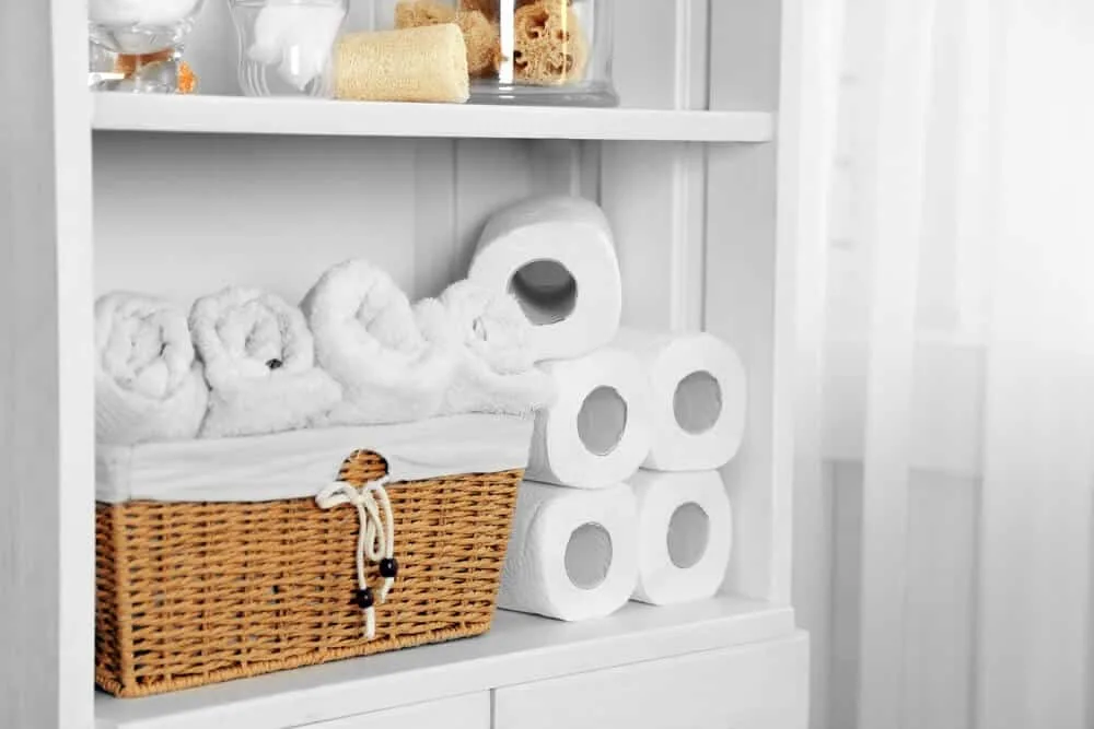 Linen closet organised with baskets