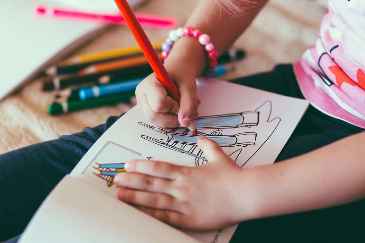Child drawing - fine motor skill development and starting school tips