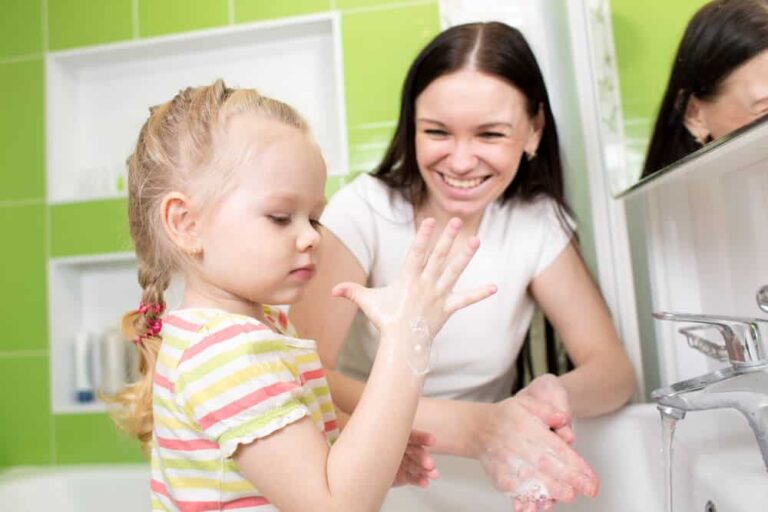 Child learning about germs and hand washing
