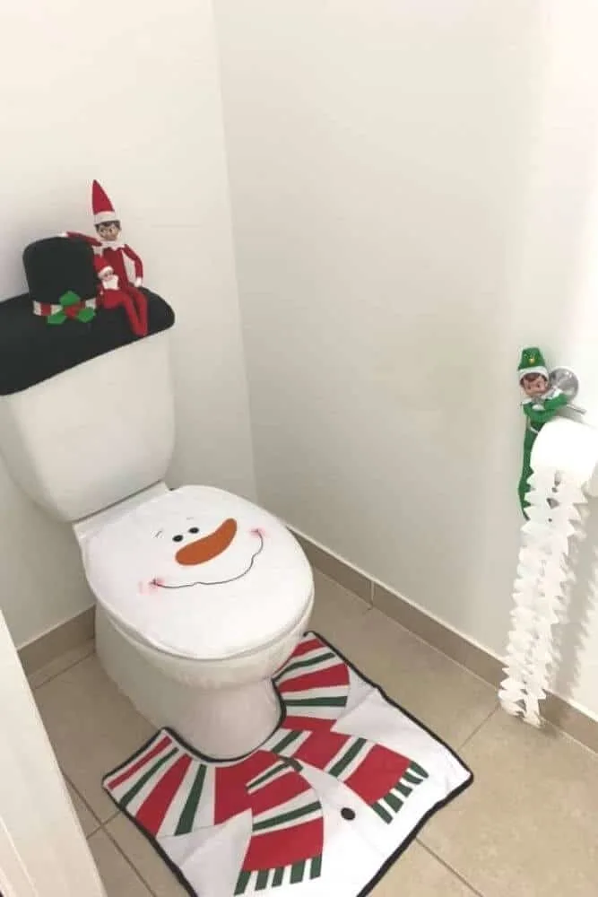 Elf on the shelf decorated toilet