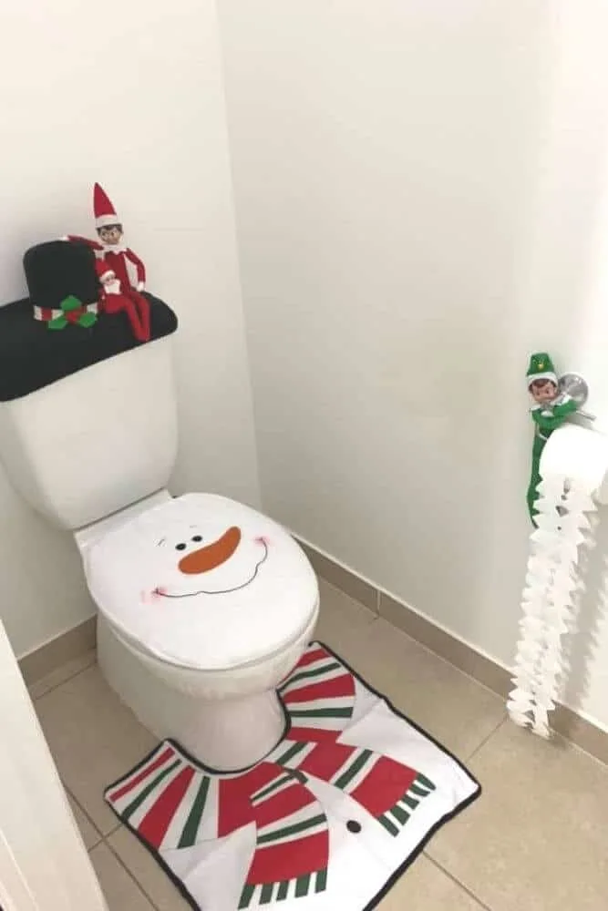 elf on the shelf decorated toilet