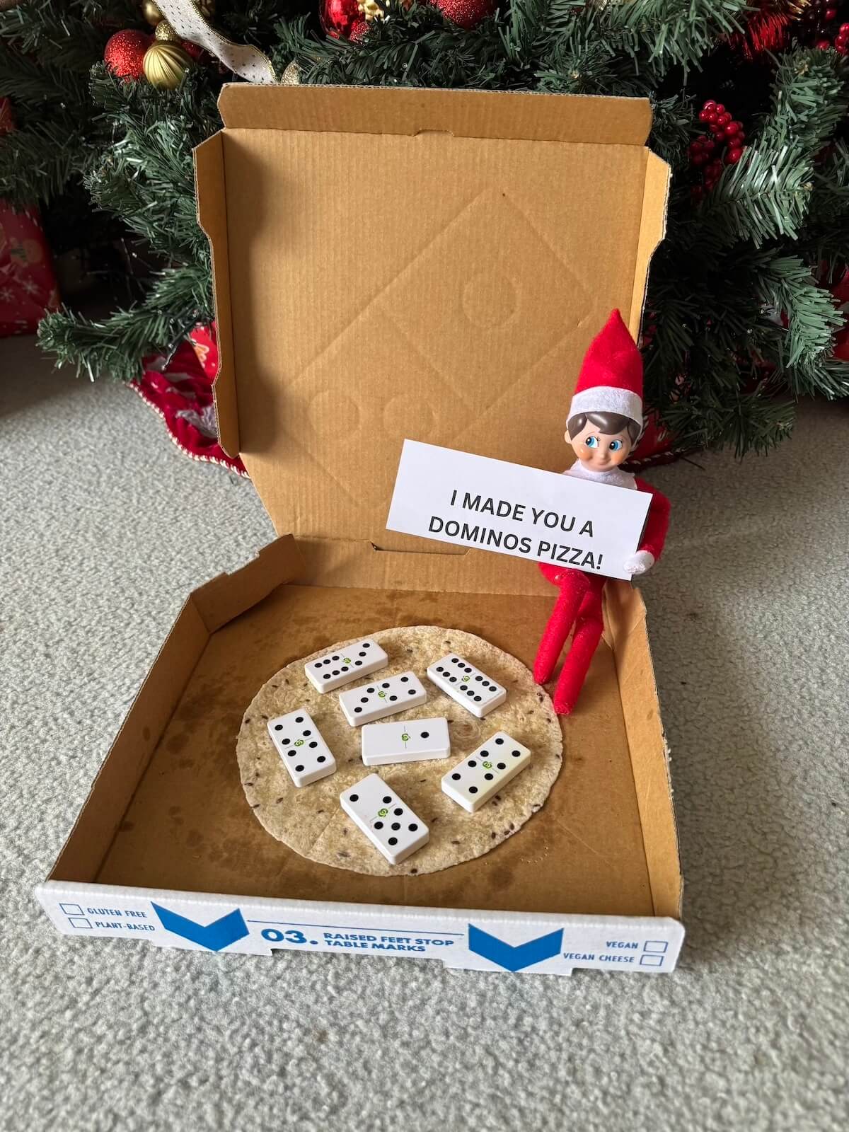 dominos pizza with actual dominos.