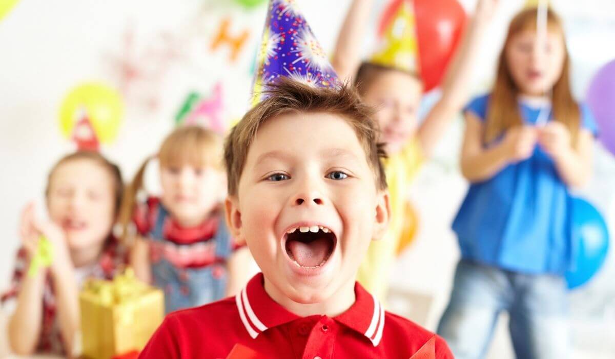 Child excited at a birthday party for kids