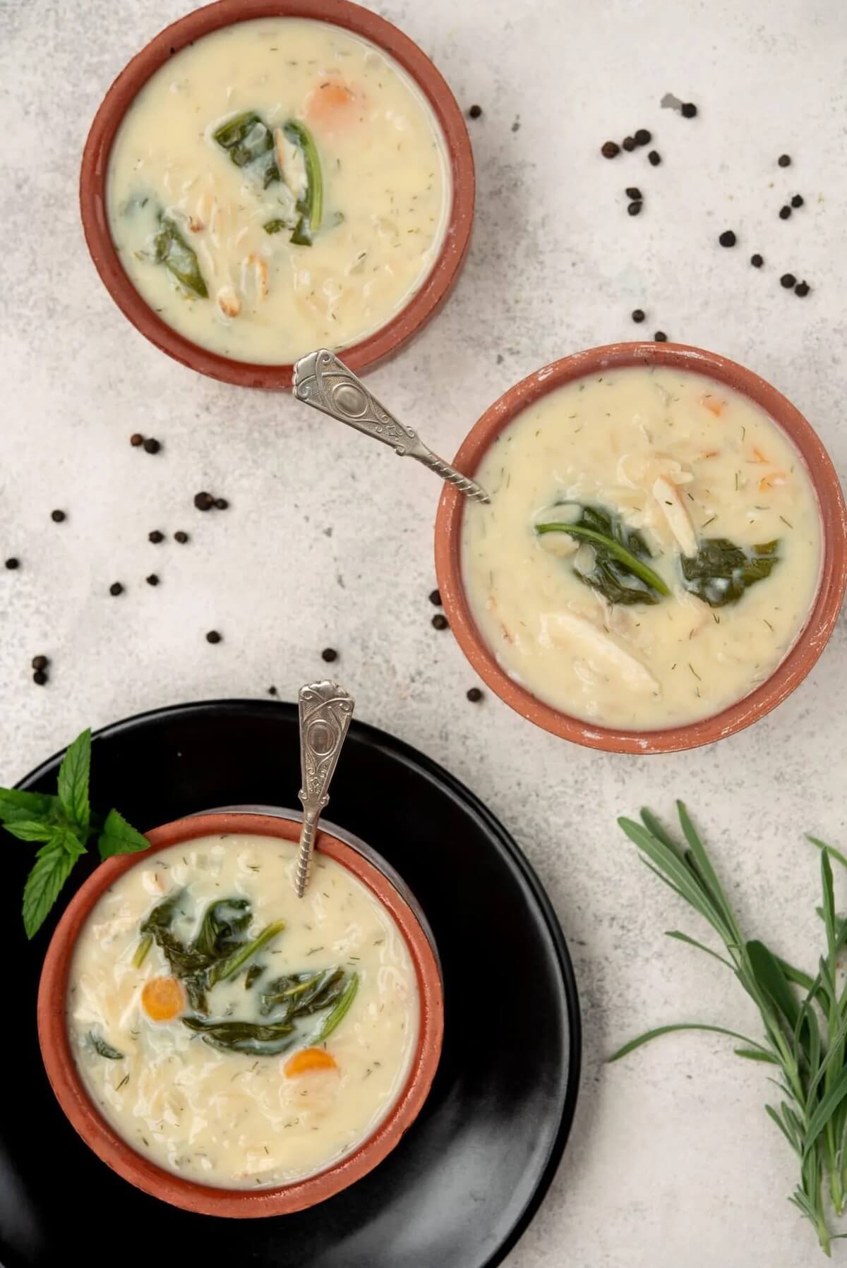 Lemon chicken orzo soup in bowls