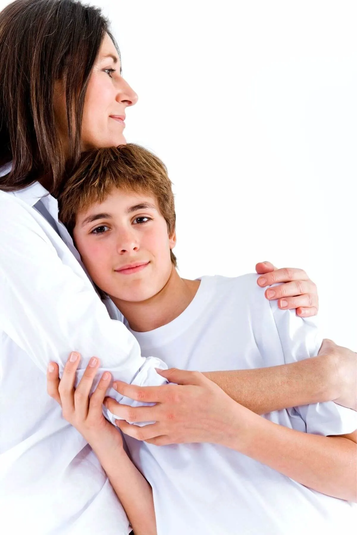 Mother hugging her teenage son