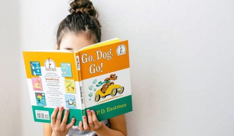 Child reading a picture book