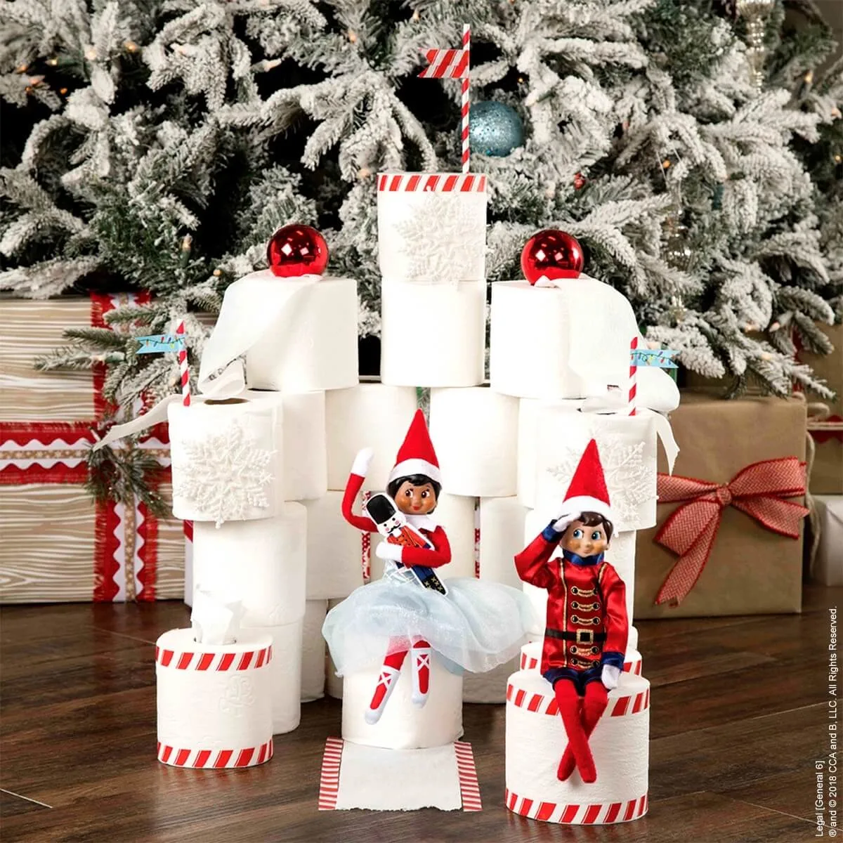 Two elf on the shelf and a toilet paper castle
