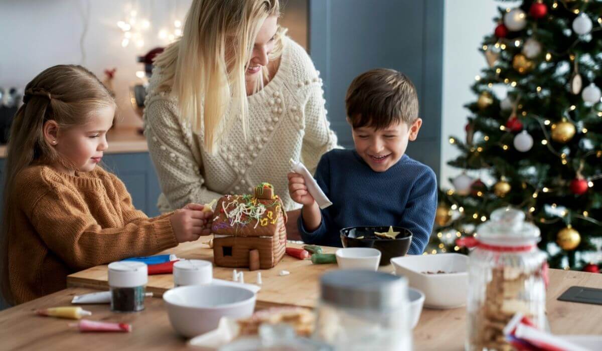 family making a gingerbread house