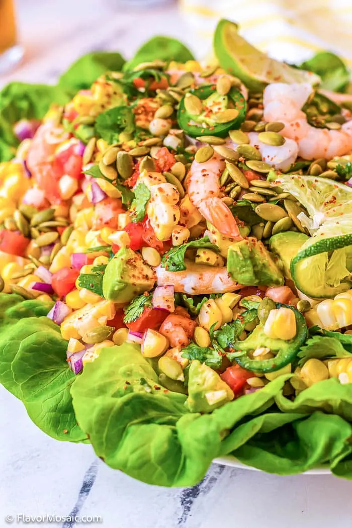 Mexican shrimp salad on platter close up