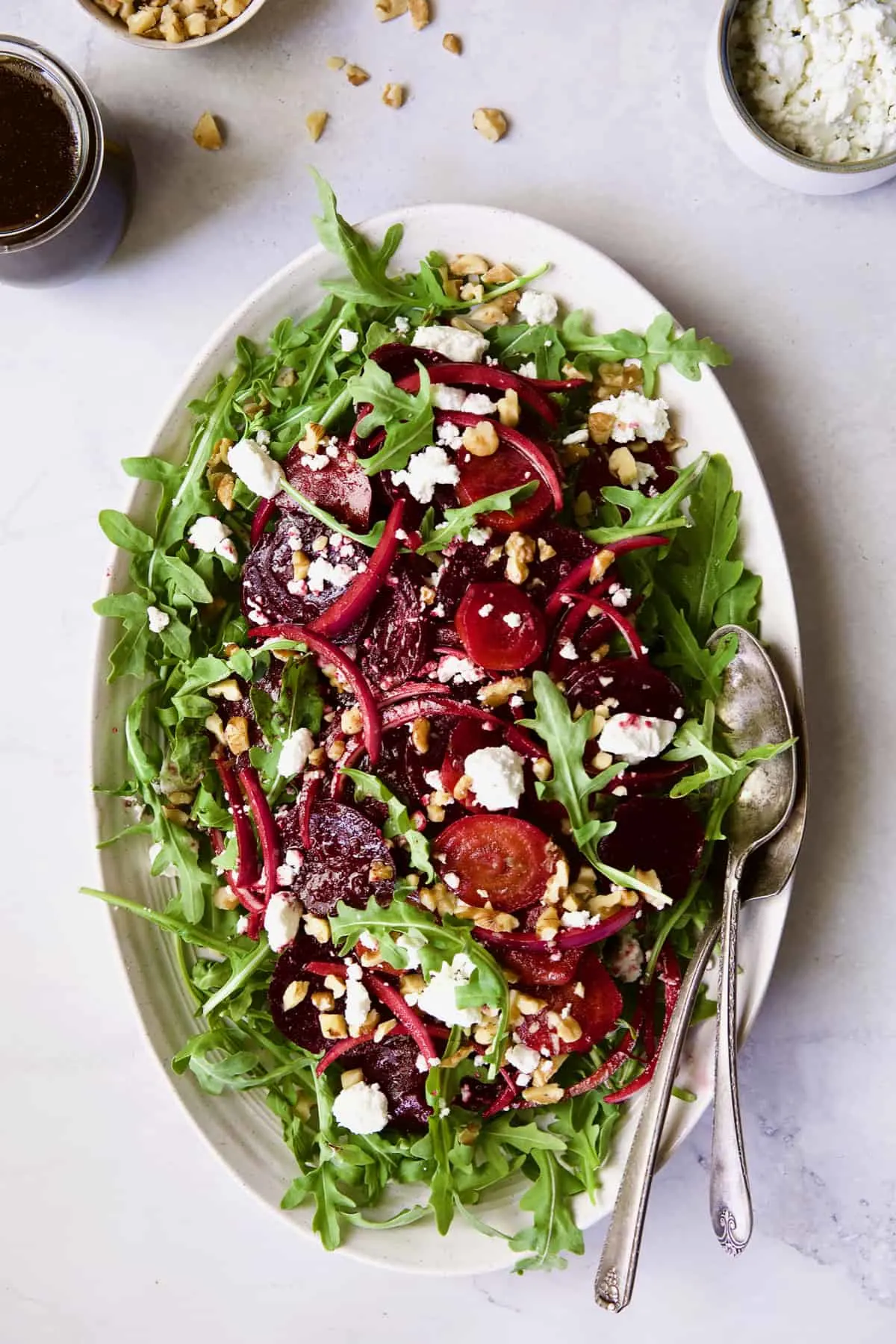 Roasted beet and walnut salad on a serving platter