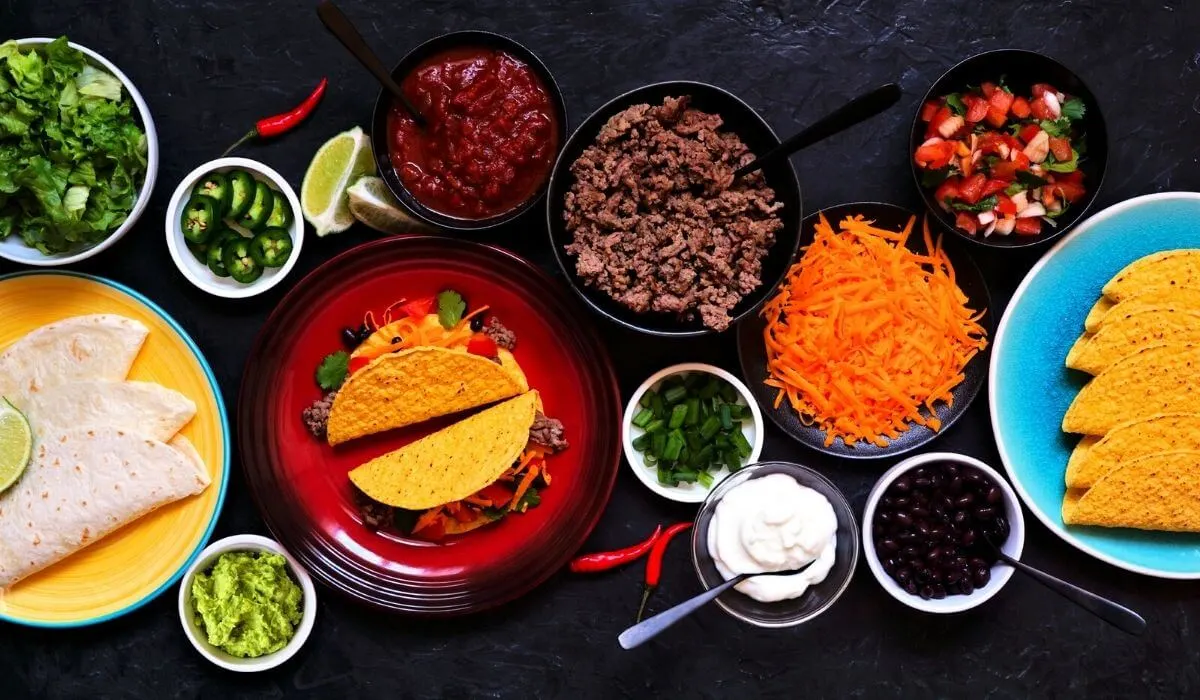 Taco bar on dark tablecloth