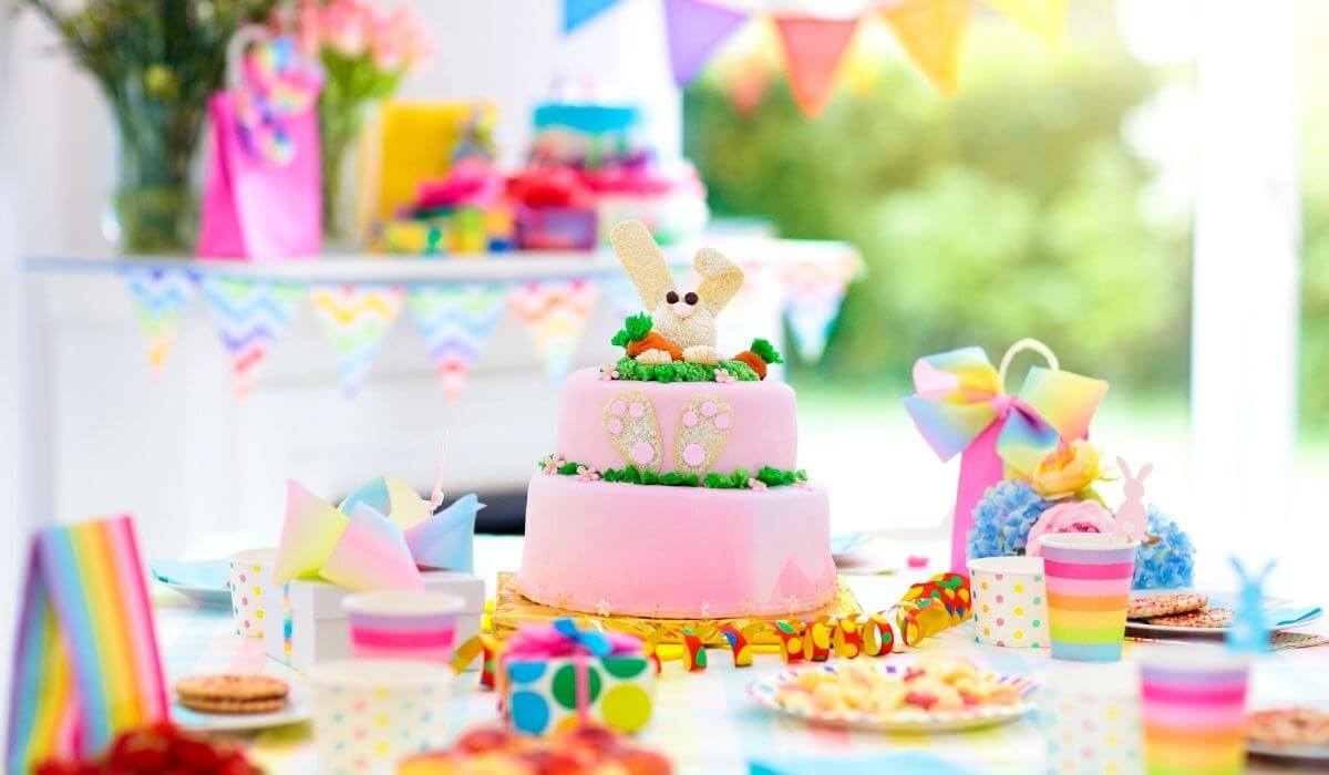 Themed kids birthday party with bunny cake and decorations