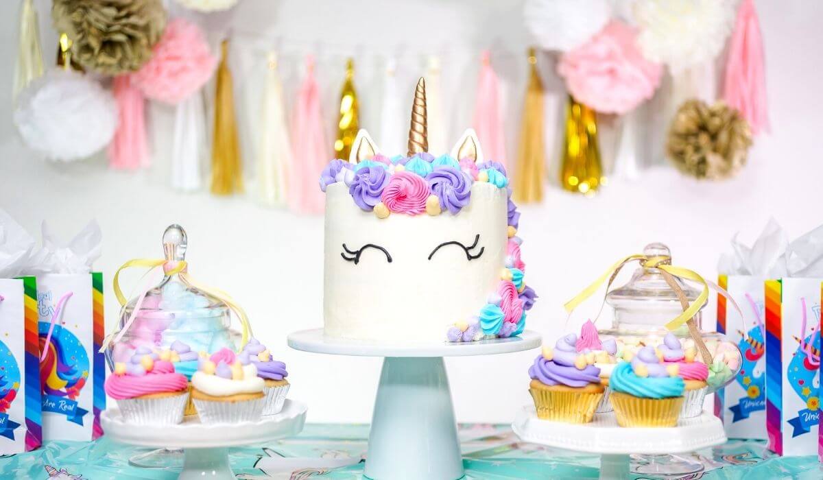 Kids unicorn party theme with unicorn cake and decorations