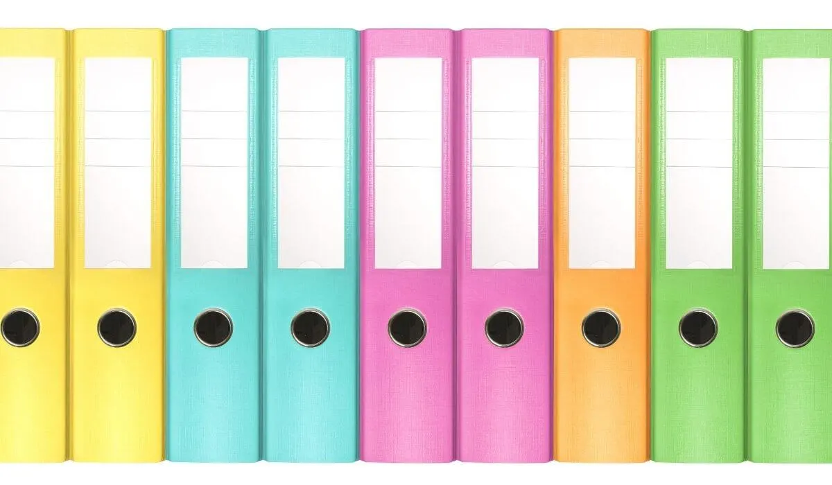 colourful binders on a shelf
