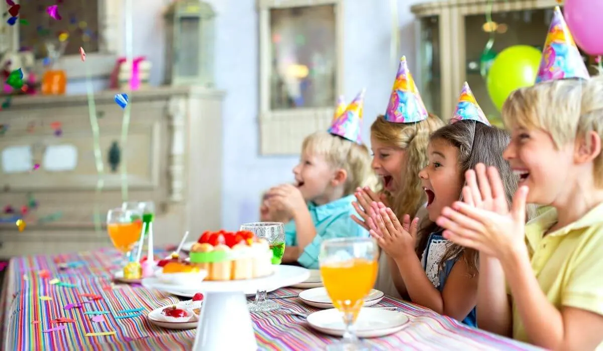 Kids at birthday party with party hats