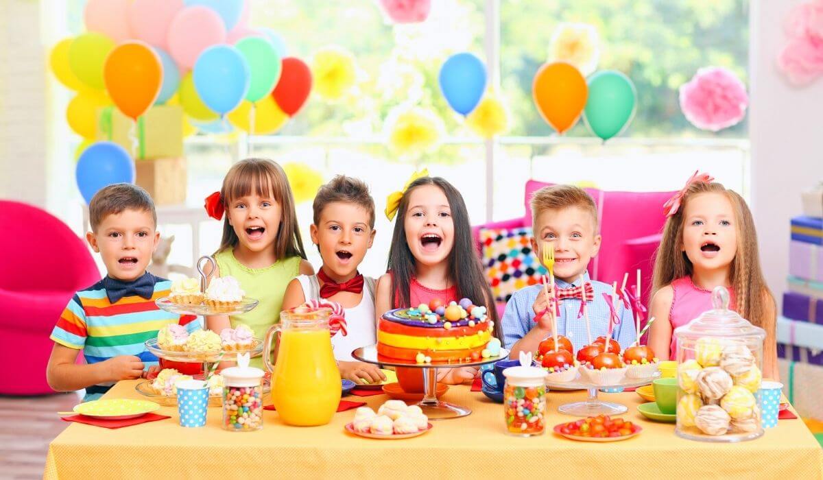 kids at a birthday party with decorations