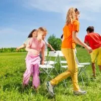 kids playing musical chairs outdoors