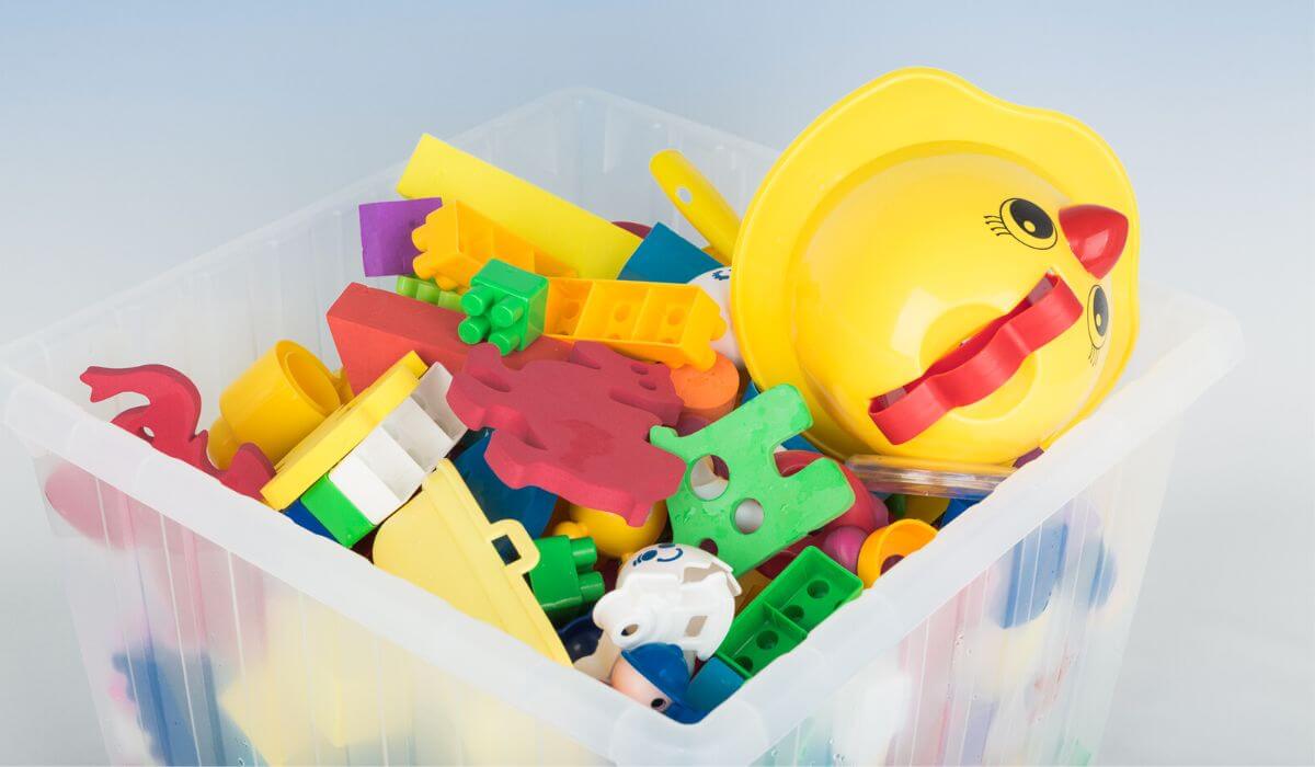 plastic storage bin with outdoor toys