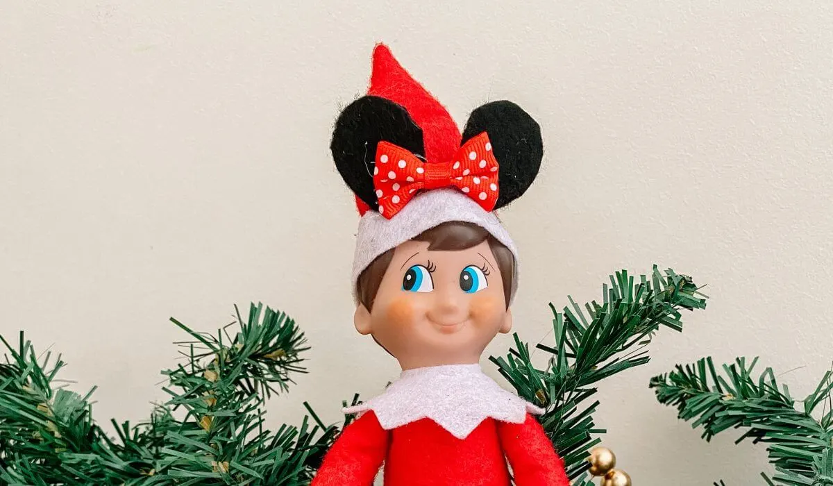 Elf on the shelf wearing minnie mouse ears