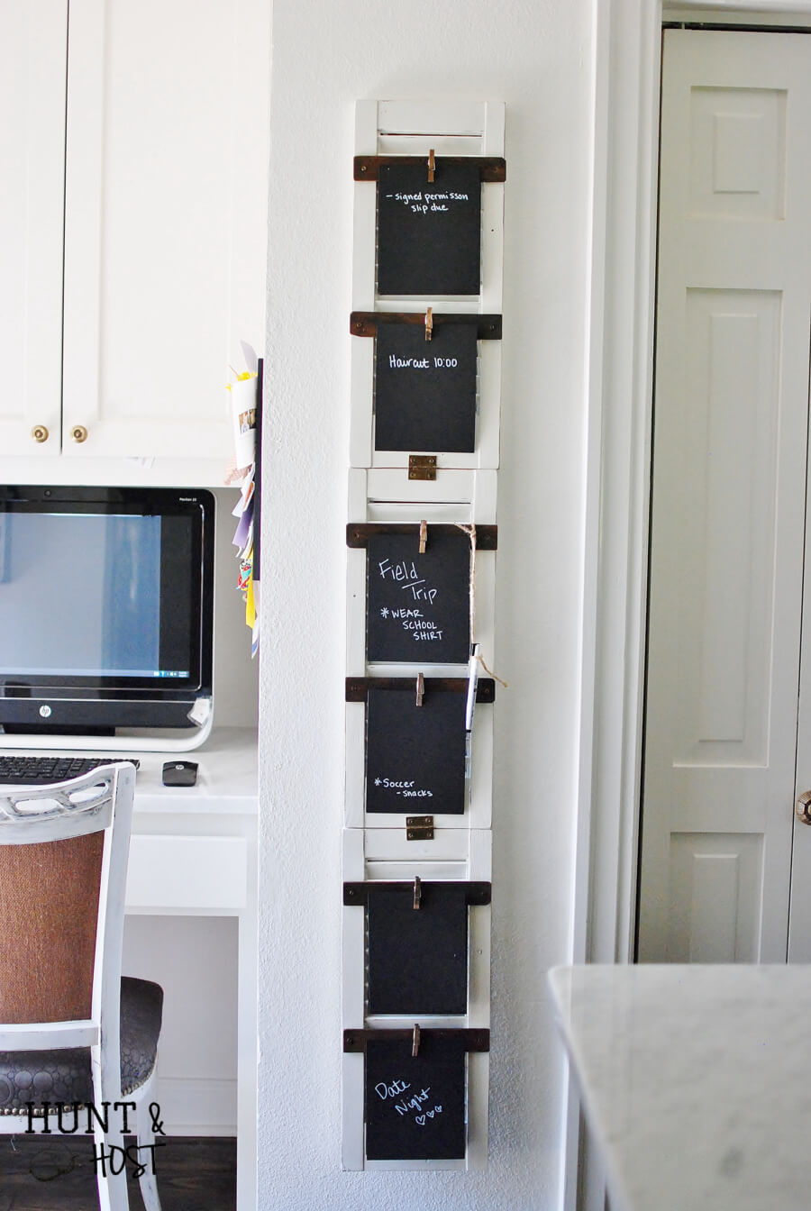 Vertical chalkboard command center in home office