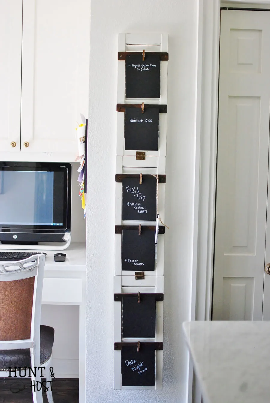 Vertical chalkboard command center in home office