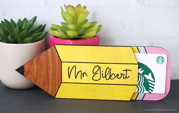Pencil shaped wooden gift card holder that says mrs gilbert on the front