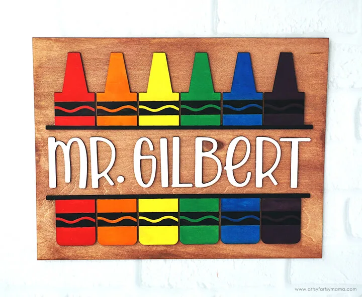 Wooden teacher sign with wooden crayon shapes and mrs gilbert wording