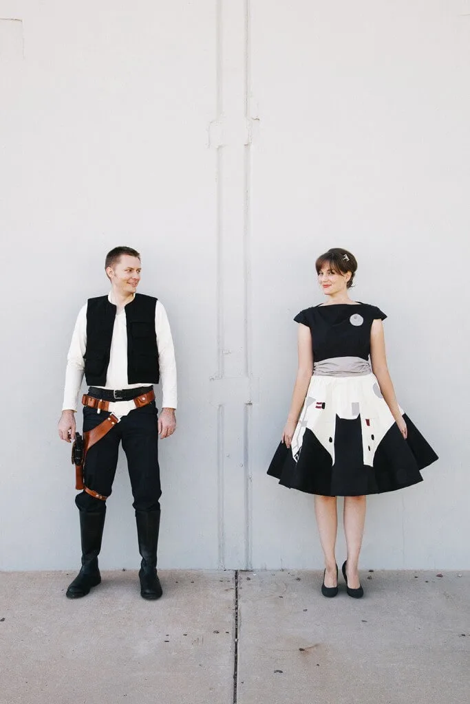 Man dressed as han solo and woman in a millennium falcon dress