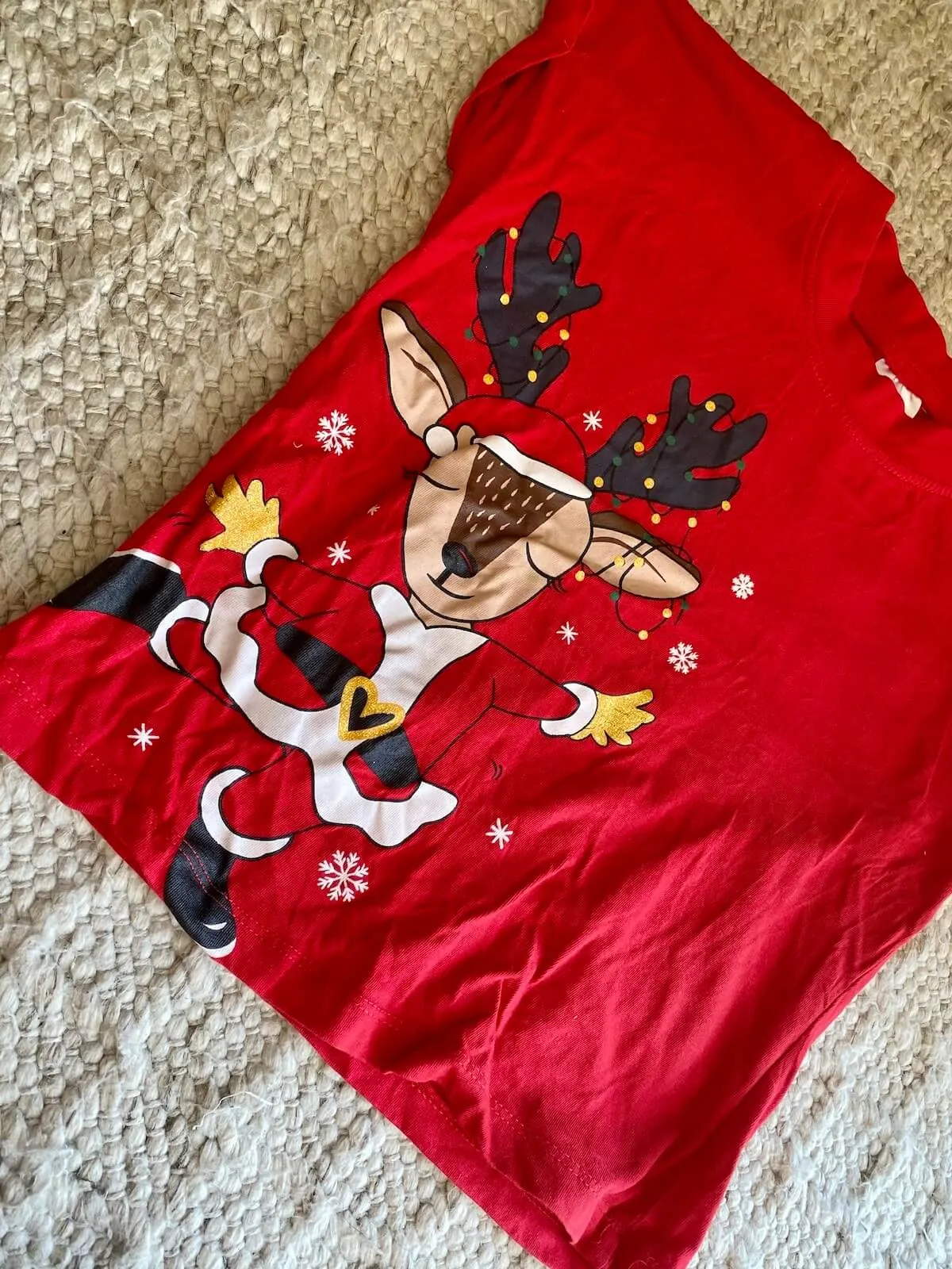 A christmas tshirt with a reindeer