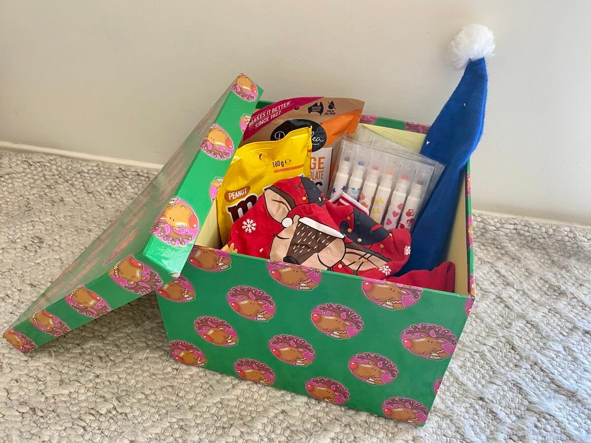 A christmas box filled with gifts for 1st of december