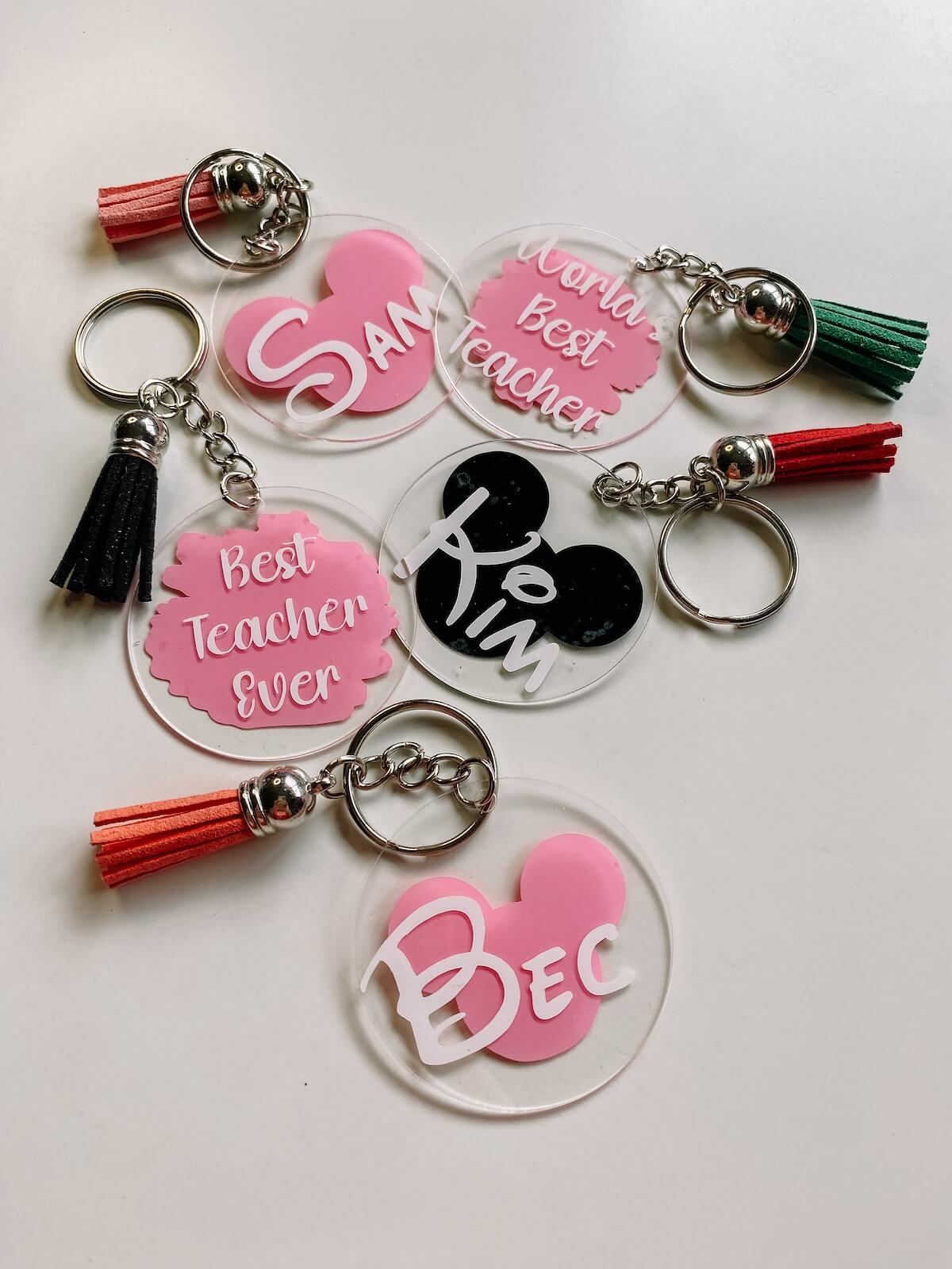 Personalised keychains made with acrylic circles and cricut joy.