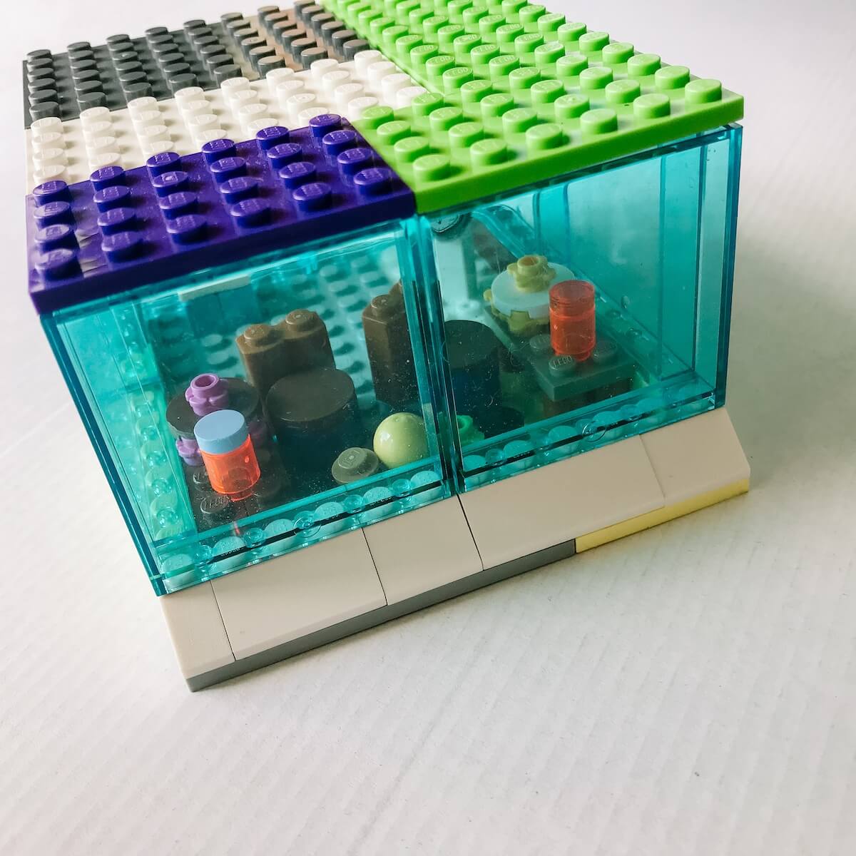 Lego building with clear window bricks.