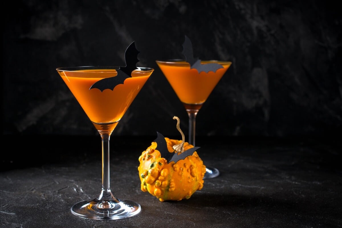 30 Spooky Halloween Party Themes For A Unique Celebration 2 halloween cocktails with black background.