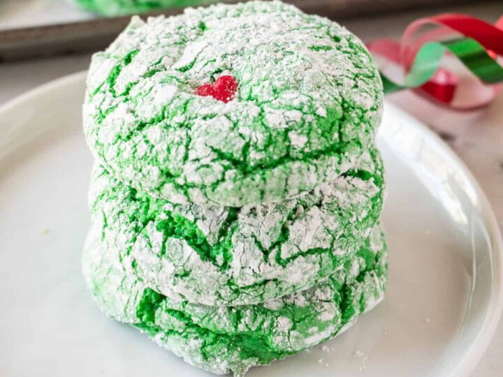 grinch cookies with red hearts.