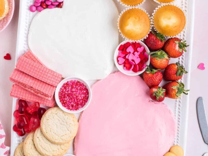 valentine's day dessert board with frosting.