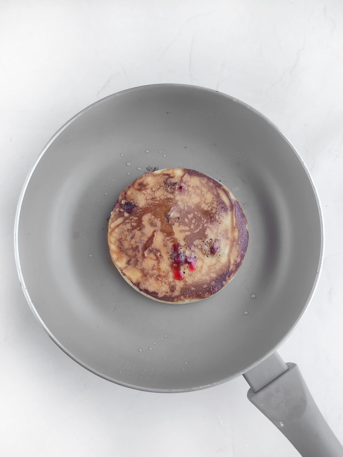 making cloud pancakes on pan.