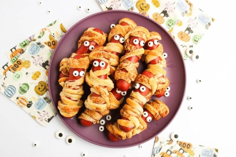 halloween mummy sausages on a plate.